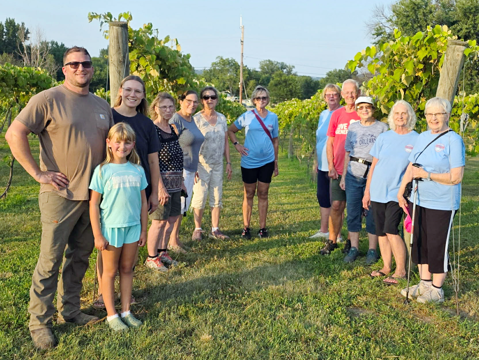 Sunni and Simon Kehren show walkers around Great River Vineyard