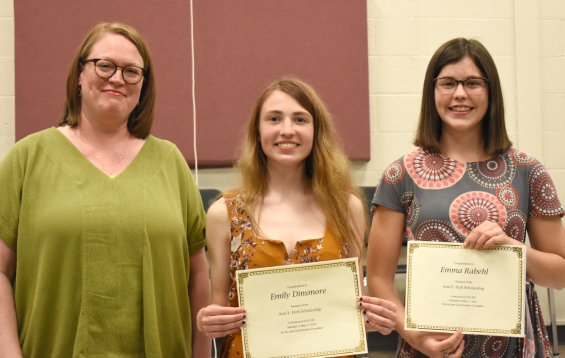 Ann E. Holt Scholarship. Two $1,250 awards. From left: presenter Amy Alkire, and recipients Emily Dinsmore and Emma Rabehl.