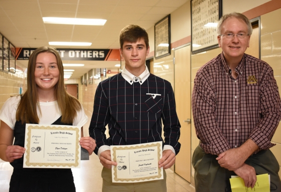 Engineering Laboratory Design, Inc., Math and Manuracturing Scholarship - three awards of $1,000 each. From left are recipients Elyse Dalager, Joseph Kozlowski, and presenter Kurt Banaszynski. Recipient Andrea Milosavljevic is not pictured.