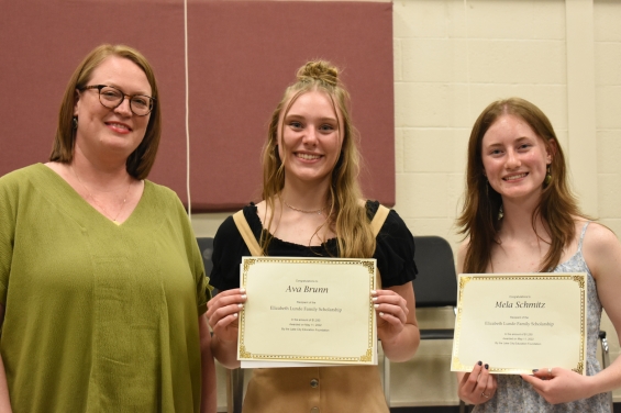 Elizabeth Lunde Family Scholarship. Two $1,250 awards. From left: presenter Amy Alkire, and recipients Ava Brunn and Mela Schmitz.