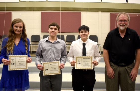 Engineering Laboratory Design, Inc. Math and Manufacturing Scholarship. Three $1,000 awards. From left: recipients Madeline Medvec, Luke Roberson, Faith Harmon, and presenter Kurt Banaszynski.