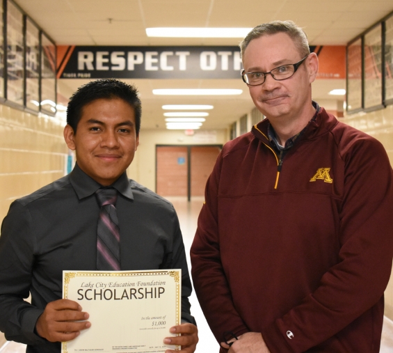 Lake City Education Foundation Scholarship Contributed by the Gates Family - $1,000. Recipient Osvin Baltazar-Gonzalez (left) with Jim Gates.