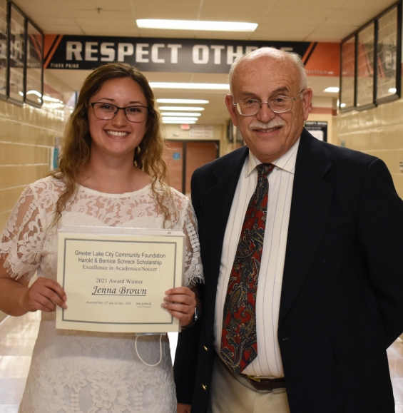 Greater Lake City Community Foundation Harold and Bernice Schreck Memorial Soccer Scholar-Athlete Scholarship - $2,000. Recipient Jenna Brown (left) with presenter Jim Schreck.