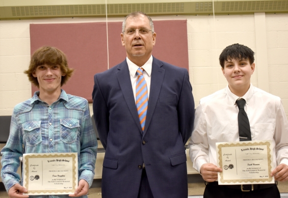 Josh Leonard Memorial Scholarship. From left: $1,000 award recipient Dane Houghton, presenter Erick Enger, and $500 award recipient Faith Harmon.