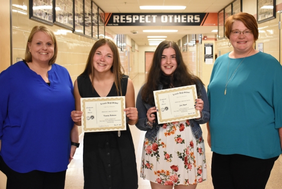 Lake City Education Association Scholarship - two $500 awards. From left: presenter Carey Kopp, recipients Kennedy Reckmann and Jade Wyatt, and presenter Amy Rogness.
