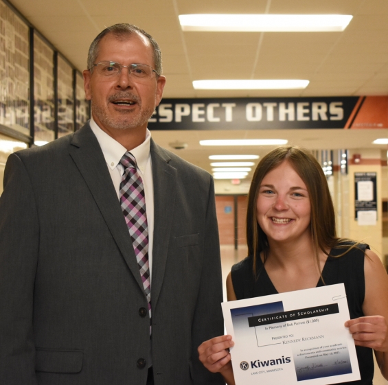 Lake City Kiwanis Club Bob Parrott Memorial Scholarship - $1,000. Recipient Kennedy Reckmann (right) with presenter Erick Enger.