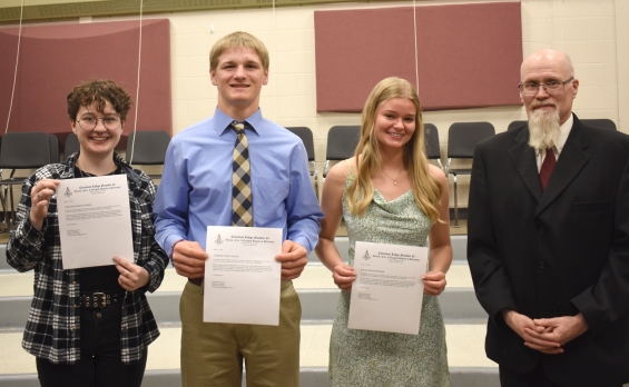Lake City Masons. Three $1,000 awards. From left: recipients Heavenly Gerken, Jonathan Harvey, and Emma Marchini-Moyer, and presenter David McCormick.
