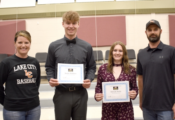Lake City Youth Baseball/Softball Association. Two $500 awards. From left: presenter Angie Meyer, recipients Justin Wohlers and Mirrah Wells, and presenter Terry Schmitz.