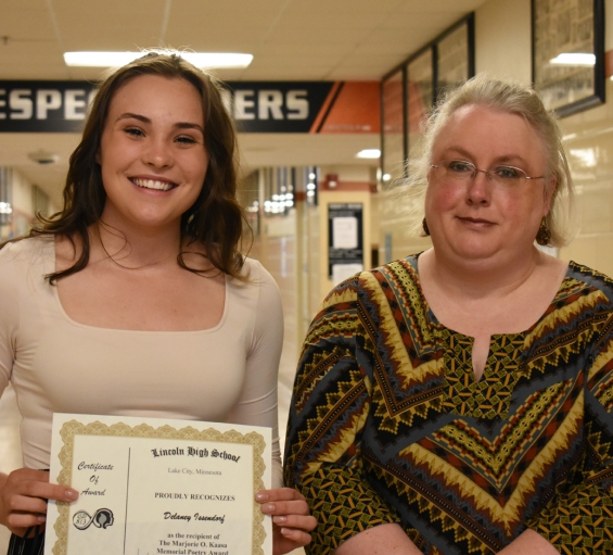 Marjorie O. Kaasa Memorial Poetry Award - $250. Recipient Delaney Issendorf (left) with presenter Candance Wait.