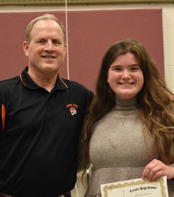 Perry Heitman Memorial Scholarship. One $500 award. From left: presenter Doug Vaith and recipient McKenna Goihl-Krier.