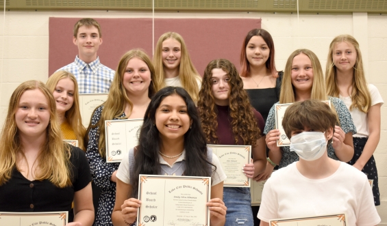 Eighth grade School Board Scholars Delilah Benjamin, Faith Bonde, Rose Coffman, Ashtyn Fuller, Patrick Kennedy, Alex Klouser, Ava Leonard, Emily Mehrkens, Thomas Nutt, Olivia Ohlhaber, Claire Schumacher, Conrad Seydel, and Emily Silva-Almanza.