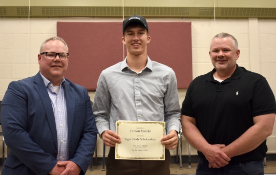 Tiger Pride Scholarship - Contributed by the Gates Family, American Family Insurance Dreams Foundation. One $3,000 award. From left: presenter David Gates, recipient Carson Matzke, and presenter Willie Gates.