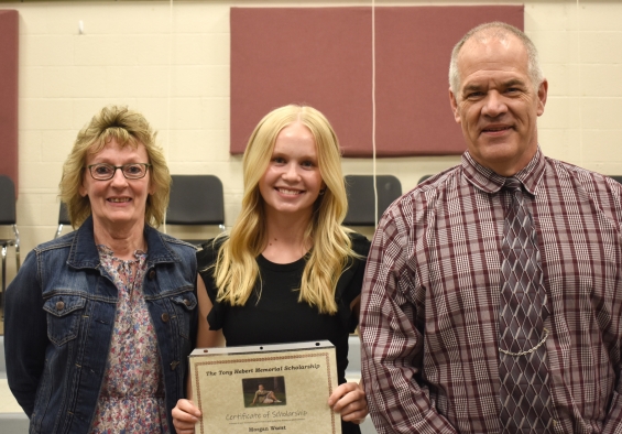 Tony Hebert Memorial Scholarship. One $1,000 award. From left: presenter Laurie Hebert, recipient Morgan Wurst, and presenter Bob Hebert.