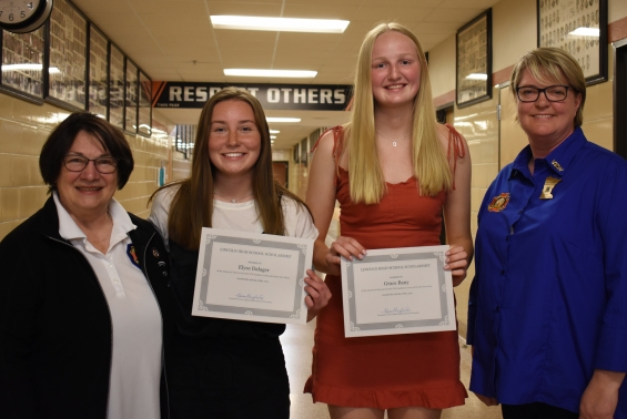 Bernard Flesche (Lake City) VFW 8729 Auxiliary. From left: presenter Mary DeRoos, recipients Elyse Dalager, and Grace Bany, and presenter Karen England.