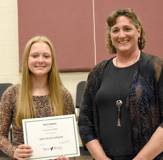 Wild Wings LLC. One $500 award. From left: recipient Carly Earnest Miller and presenter Jennifer White.