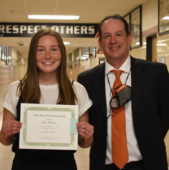 Zumbro Falls VFW Post 1802 - $1,000. Recipient Elyse Dalager (left) with presenter Greg Berge.