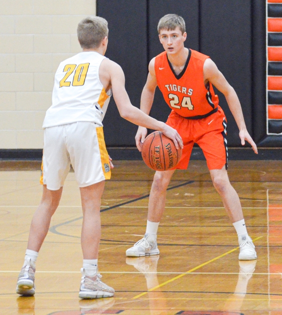 Atticus Heise (24) on defense against Plainview-Elgin-Millville in the home court win Jan. 30.