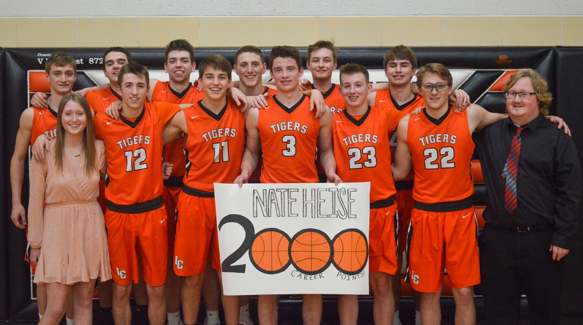 The Tiger boys basketball team put an exclamation point on an already outstanding season when they recorded their 24th straight home win over Plainview-Elgin-Millville Jan. 30. Along with the accolade, Nate Heise recorded his 2,000th career point. Front row, from left: student manager Tori Oliver, Andrew Green, Josh Renelt, Nate Heise, Jackson Berge, Mason White and student manager Christian Hansen; back row, from left: Atticus Heise, Mac Heise, Brady Schurhammer, Reid Gastner, Tony Gates and Jake Wohlers.