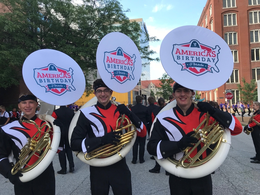 Three Tiger Marching Band sousaphone players, from left: Owen Meyers, Kris Ryan and Jon Klouser in St. Louis ready to play at the America’s Birthday Parade celebration.