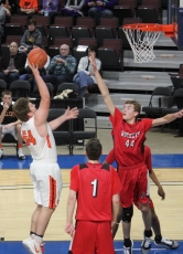 Josh Matanich (54) goes up for a shot against John Marshall last Friday in the Rotary Holiday Classic. He finished with six points.