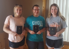 Team awards were presented to, from left: Kasi Cronin, defensive MVP; Nora Baer, offensive MVP and Hiawatha Valley League All-Conference; and Ashley Thieren, most improved.