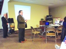 Hotel developer Ed Vandernast spoke to about 30 people at a Destination Lake City meeting Wednesday morning. He has teamed up with Dave Rodewald (left) to develop a hotel for downtown Lake City.